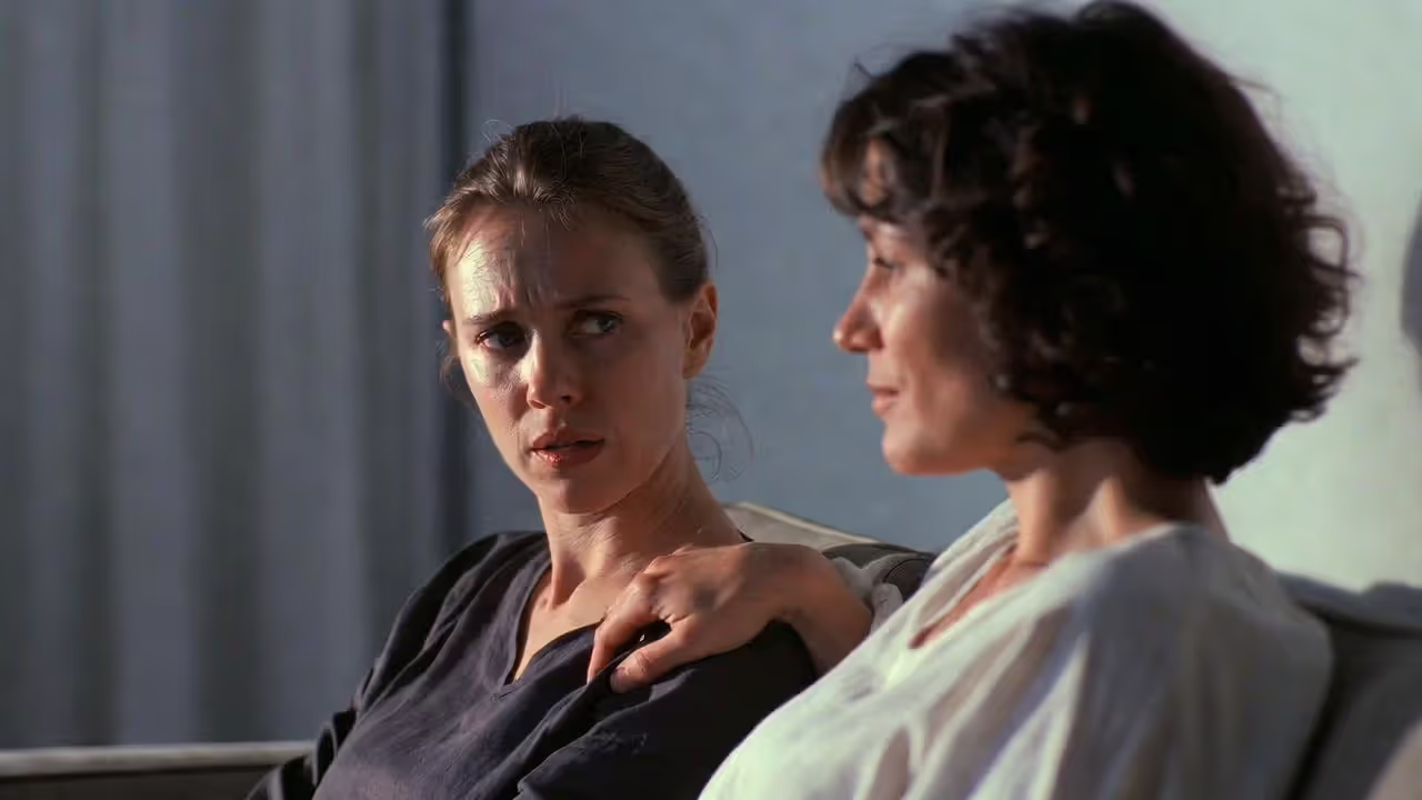 Couple demonstrating contrasting attachment behaviors with supportive interaction